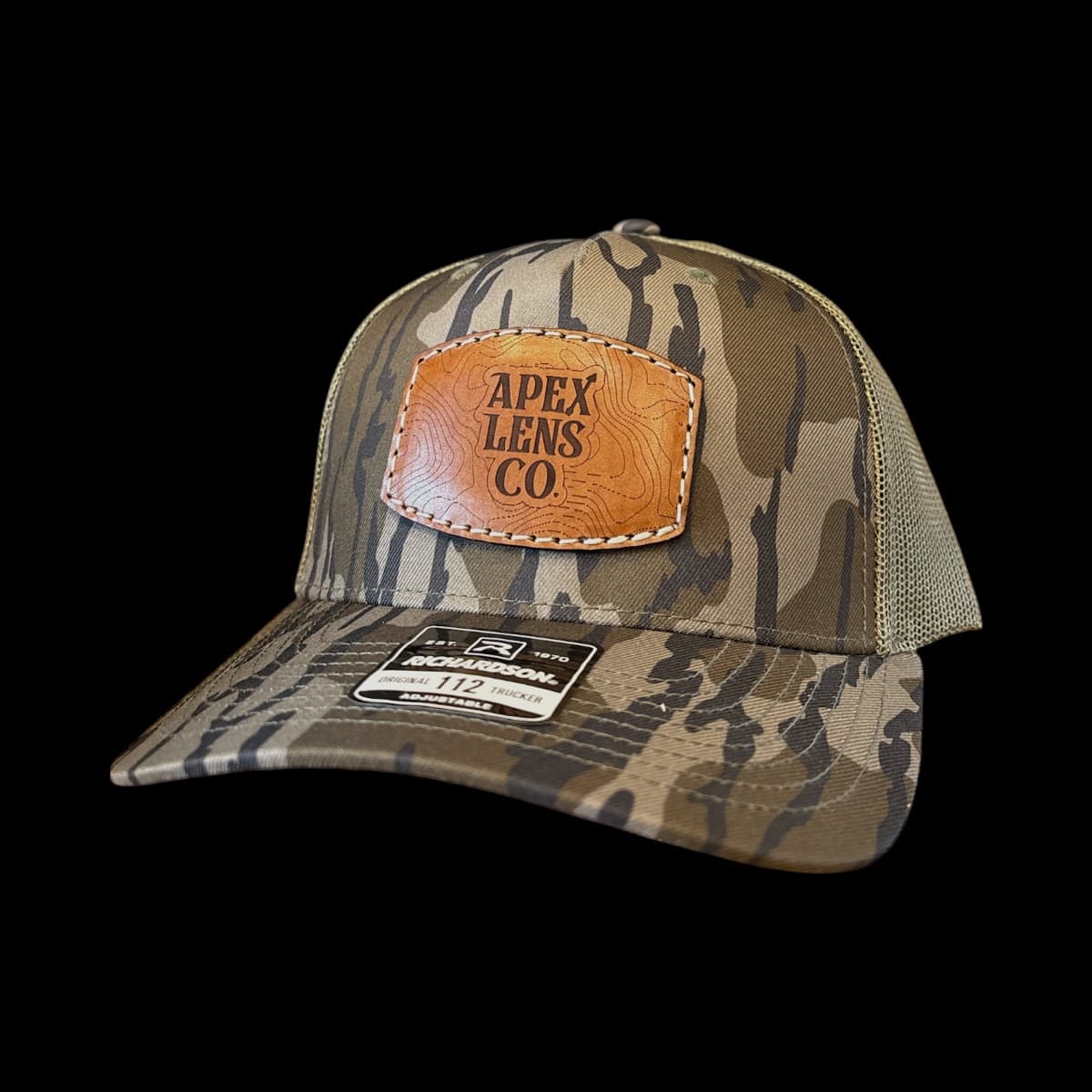 Hand-pressed leather patch hat in production